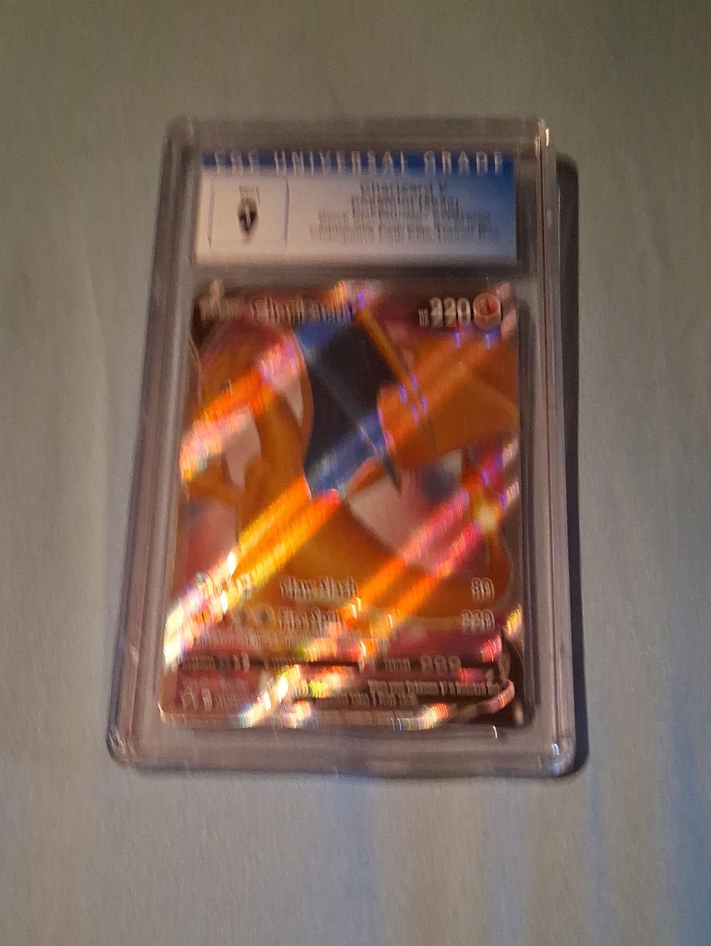 Pokemon Charizard Orange Holo Graded Card